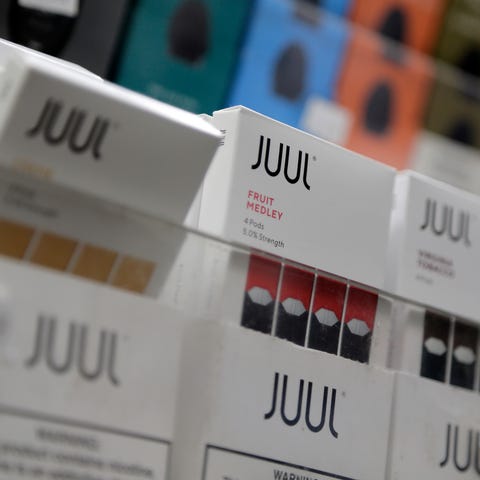 Juul products are displayed at a smoke shop in New