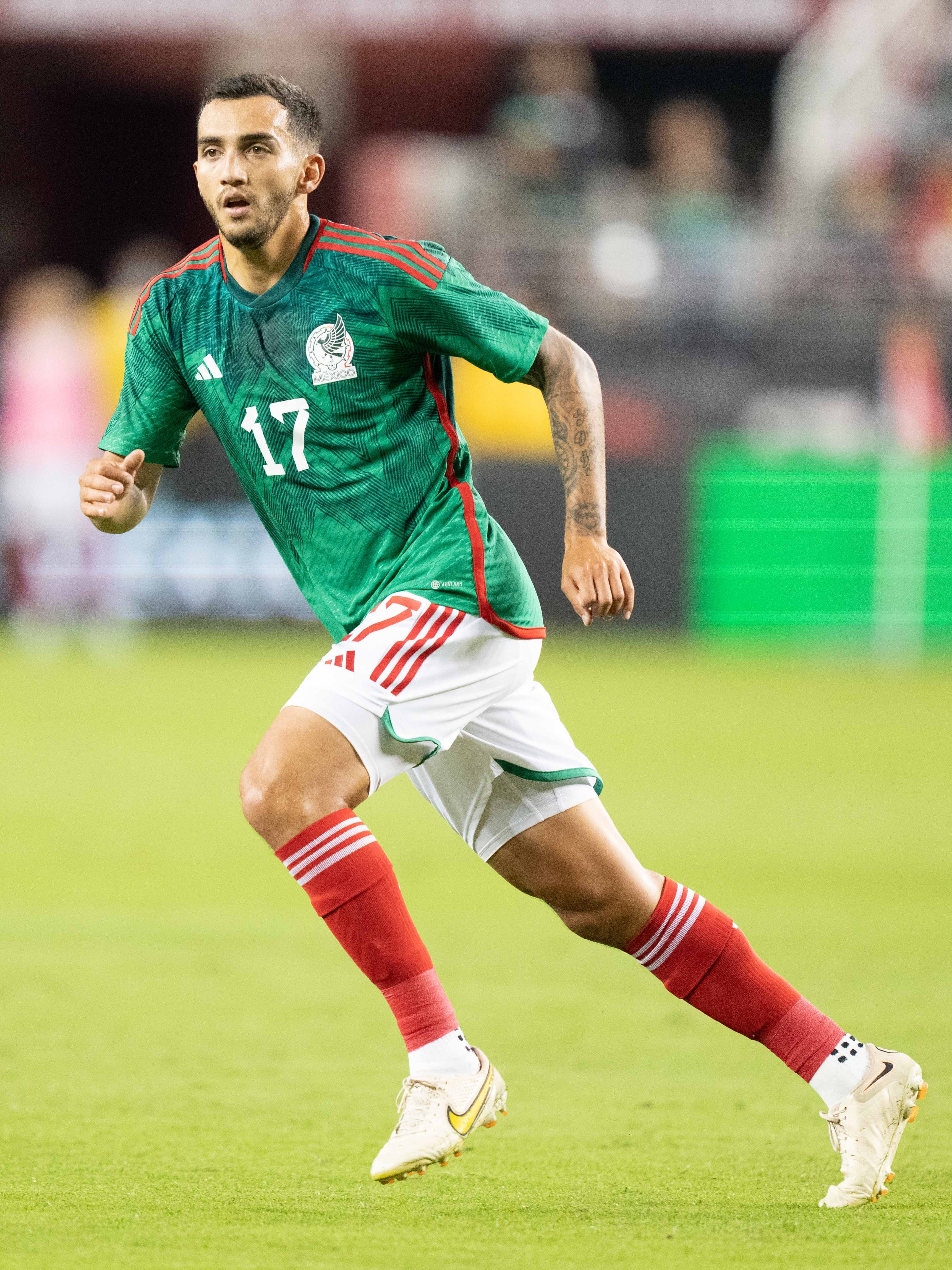 An action image of Luis Chavez playing soccer.