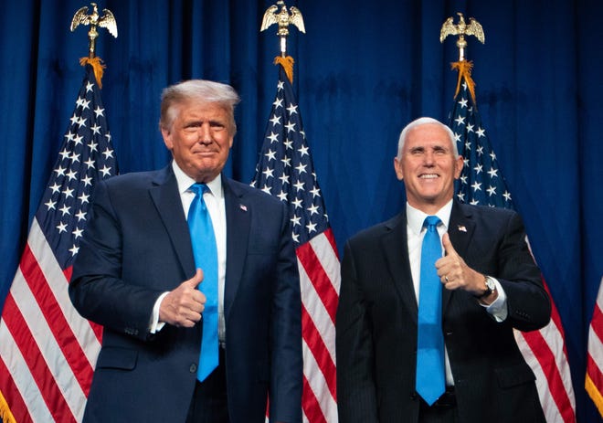 President Donald Trump and Vice President Mike Pence attend the first day of the Republican National Convention in Charlotte, North Carolina, on August 24, 2020.