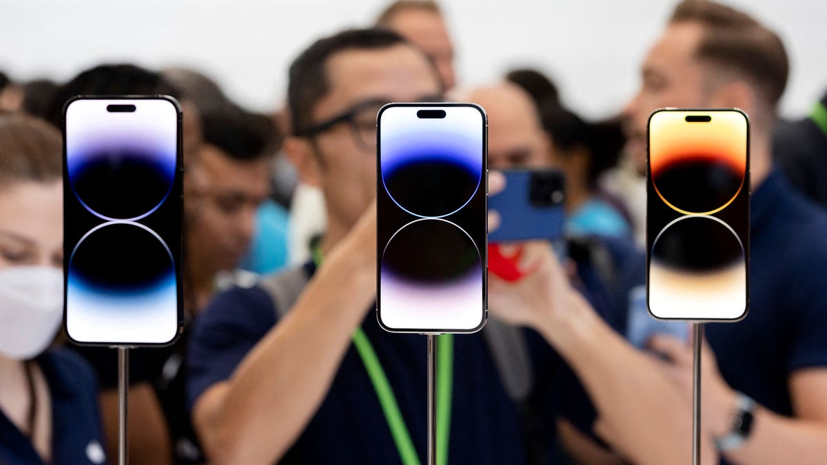 The new iPhone 14 Pros and 14 Pro Max are on display at an Apple event at Apple Park in Cupertino, California, on September 7, 2022. - Apple unveiled several new products including a new iPhone 14, iPhone 14 Plus, 14 Pro and iPhone 14 Pro Max. They also released three Apple watches and new AirPods Pros during the event. (Photo by Brittany Hosea-Small / AFP) (Photo by BRITTANY HOSEA-SMALL/AFP via Getty Images) ORIG FILE ID: AFP_32HW36L.jpg
