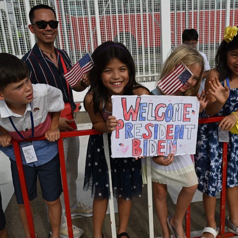 Children of US embassy staff greet US President Jo
