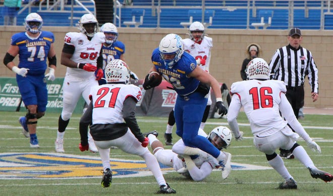 SDSU's Isaiah Davis is tackled in the second quarter of his team's 31-7 win over Illinois State on Saturday in Brookings.