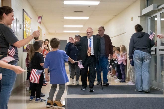 Veterans, including Sebring Police Chief Ray Harris, a U.S. Army veteran, were greeted with a chorus of thank-yous from kindergarteners, first- and second-graders at B.L. Miller Elementary School in Sebring on Friday, Nov. 11, 2022.