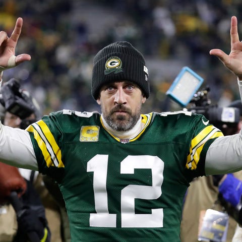 Green Bay Packers quarterback Aaron Rodgers (12) a