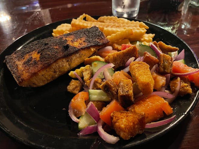 201 Cafe and Wine Bar in Oak Ridge features dishes such as the Slammin’ Salmon, pictured here served with french fries and panzanella salad.
