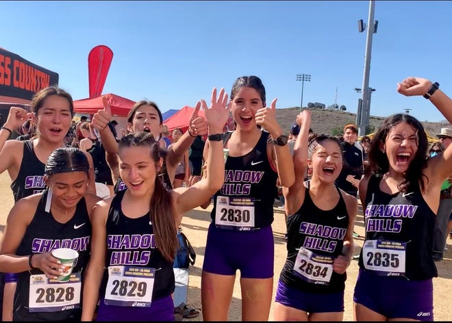 The girls' cross country team at Shadow Hills High School celebrates advancing to the CIF Southern Section Finals on Saturday, Nov. 12, 2022 at Mt. San Antonio College in Walnut, California.
