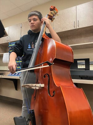 Hibberd Program Building eighth-grader Cooper Smith plays his instrument during class. Smith was named to the 2023 Indiana Junior All-State Honor Orchestra.