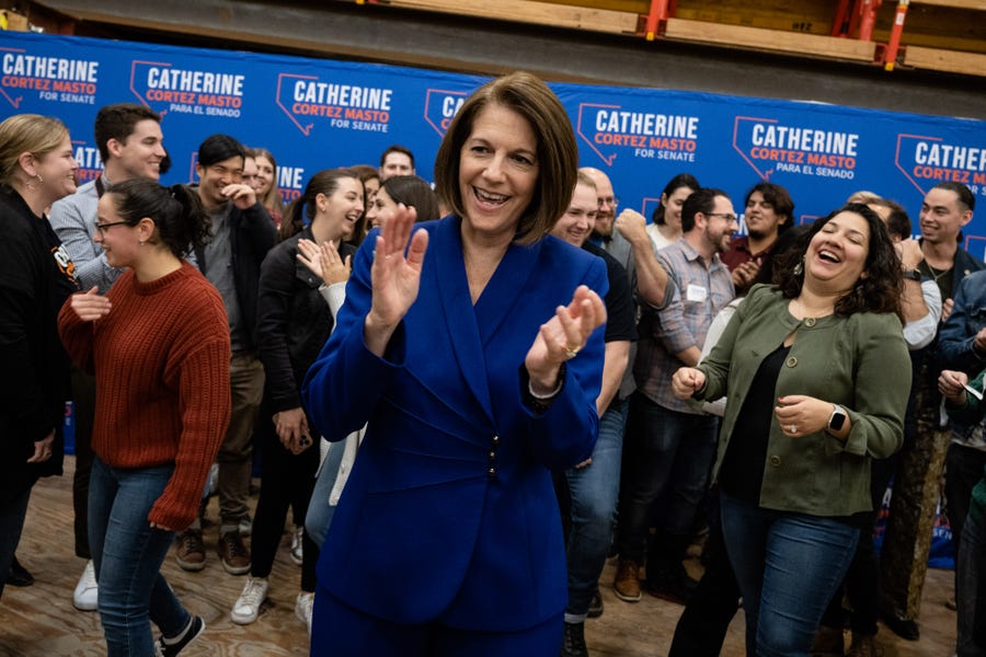 U.S. Sen. Catherine Cortez Masto (D-NV) departs after taking photos with supporters and giving victory remarks at Carpenters International Training Center on November 13, 2022 in Las Vegas, Nevada.