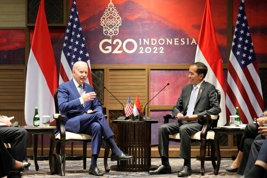 U.S. President Joe Biden, left, talks with Indonesian President Joko Widodo during their bilateral meeting ahead of the G20 Summit in Nusa Dua, Bali, Indonesia, Monday, Nov. 14, 2022.
