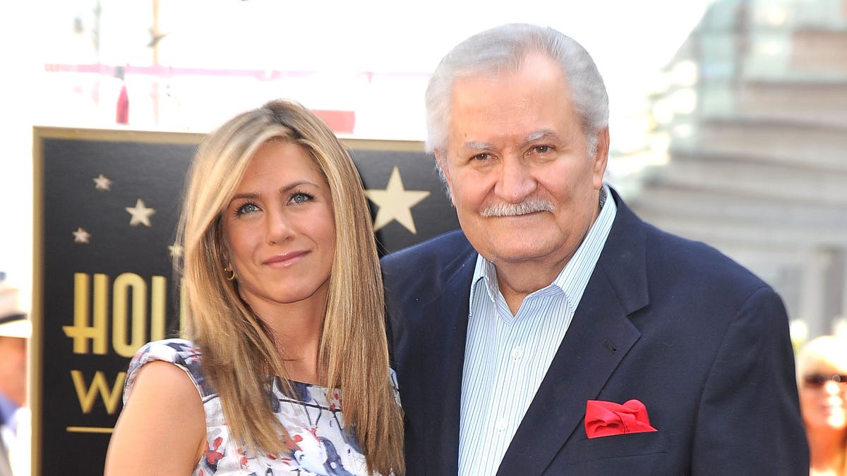 Jennifer Aniston and John Aniston attends the Jennifer Aniston Hollywood Walk Of Fame Induction Ceremony on February 22, 2012 in Hollywood.