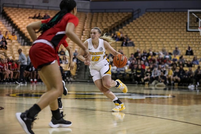 Missouri Tigers guard Haley Troup (13) handles the ball during the second half of the Tigers' game against SEMO Redhawks Sunday at Mizzou Arena in Columbia.