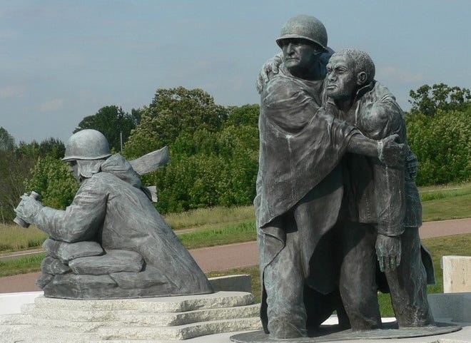 Korean War tribute is comprised of three figures placed on a platform in the shape of Korea surrounded by water and reflects the difficult conditions experienced by the soldiers who fought in places with names like Heartbreak Ridge.