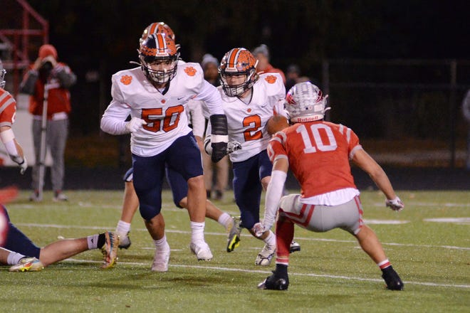 Galion's Landon Kurtzman (50) leads the way blocking for Gabe Ivy out of the backfield.