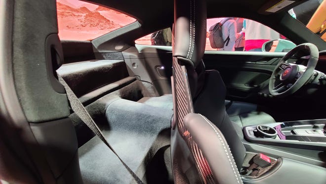 No rear seat for you. To save weight, the rear seat in the 2023 Porsche 911 Dakar is deleted.