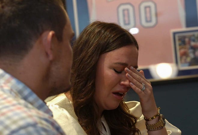 Emma Kelly cries while speaking about her daughter Tuesday, Nov. 8, 2022, in Zionsville. Kelly was 19 weeks pregnant at the time of her daughter’s passing. 