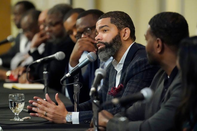 Jackson, Miss., Mayor Chokwe Antar Lumumba responds to a question during a roundtable forum that involved EPA Administrator Michael S. Regan, right, and Jackson-area businesspeople, community leaders, residents and educators, about the efforts underway to deliver a sustainable water system for Jackson residents on Tuesday, Nov. 15 at Jackson State University.
