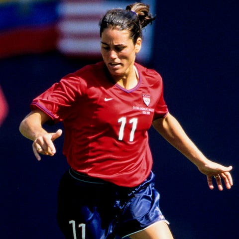 U.S. midfielder Julie Foudy in action against  Den