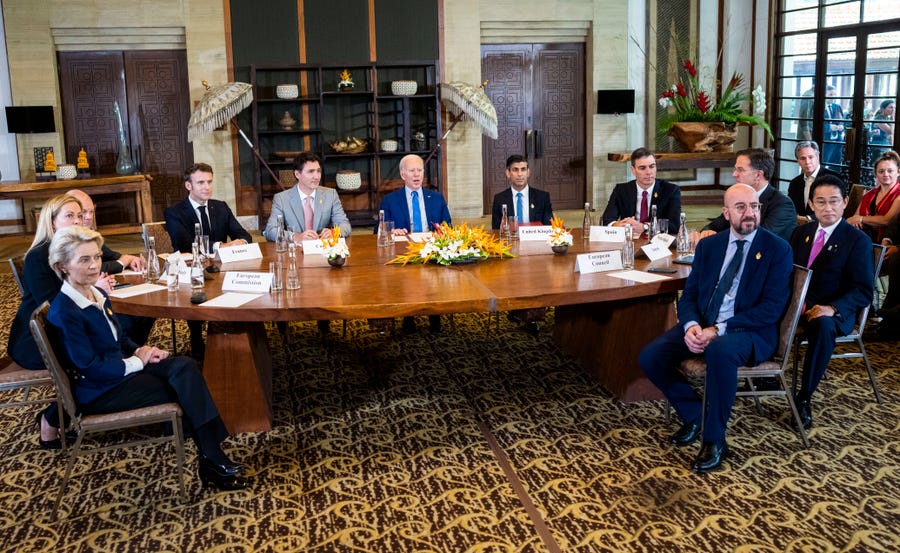 From left, President of the European Commission Ursula von der Leyen, Italian Prime Minister Giorgia Meloni, German Chancellor Olaf Scholz, French President Emmanuel Macron, Canadian Prime Minister Justin Trudeau, U.S. President Joe Biden, British Prime Minister Rishi Sunak, Spanish Prime Minister Pedro Sanchez, Netherlands Prime Minister Mark Rutte, Japanese Prime Minister Fumio Kishida and European Council President Charles Michel during a meeting of G7 and NATO leaders in Bali, Indonesia, Wednesday,   Nov. 16, 2022.