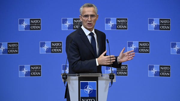 NATO Secretary General Jens Stoltenberg gestures a