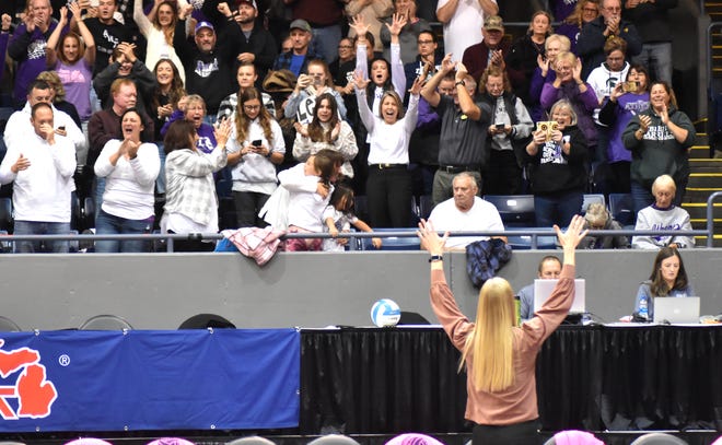 Athens head coach Jacy Cole acknowledges the Athens faithful Thursday after her team punched their ticket to the MHSAA D4 State Volleyball Finals