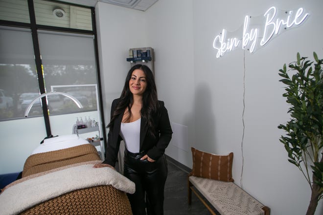 Business owner Brie Auerbach poses for a portrait in the salon of her new healthy skin care business, Skin by Brie on Thursday, November 17, 2022, in Delray Beach, FL.