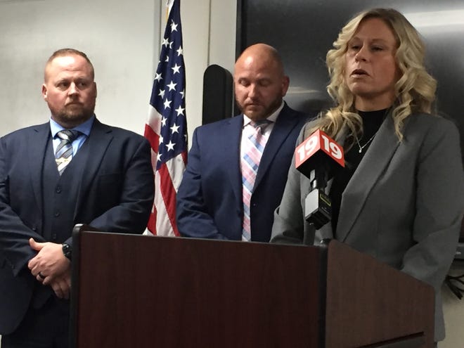 Jodie Schumacher, First Assistant Prosecutor for Richland County, talks about the John Mack Jr. case at a press conference Thursday. To her left are sheriff's Detectives Jason Shoemaker and Josh Dawson.