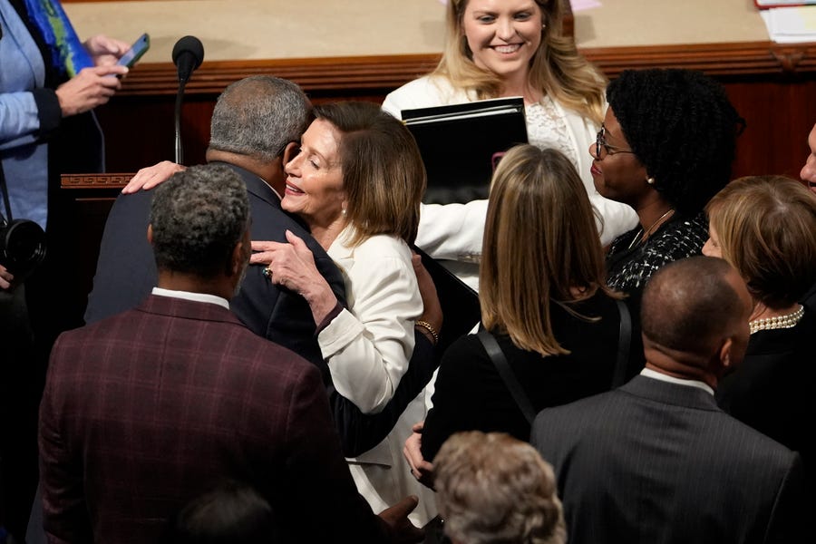 House Speaker Nancy Pelosi greets Democratic Party members on the floor of the House of Representatives after announcing she will step down from her leadership role when the Republicans claim a majority in the House in the next congressional term, Thursday, Nov. 17, 2022, on Capitol Hill in Washington.