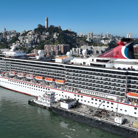 In an aerial view, the Carnival Miracle cruise shi