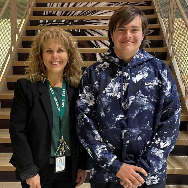 West Branch Local Schools Superintendent Micki Egli, left, and the district's School Board honored student Brock Boyle at its September meeting.