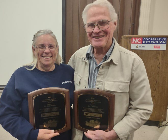 Lynn Meeks and Dr. Curtis Ish were given the 2022 Service to Agriculture and Extension award by the Davidson County NC Cooperative Extension during it annual Farm City Luncheon on Friday.