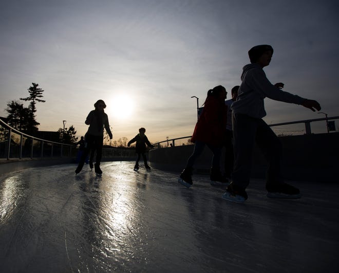 In this file photo, skaters make their way around the ice Monday, Dec. 23, 2019, at Howard Park in South Bend. The ice path and pond open for the season Nov. 25 and remain open until March 11, 2023.