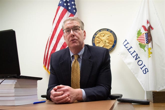 Senate Minority Leader-elect John Curran sits for an interview in his Springfield office Wednesday, one day after his caucus chose him as its next leader. He said in the interview his goal is to bring "balance" to state government.