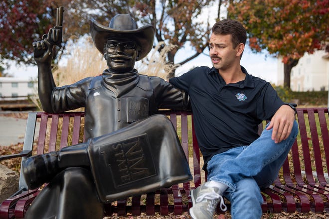 Stephen Wagner, reporter for the Las Cruces Sun-News, poses for a photo with a statue of Pistol Pete on Wednesday, Nov. 16, 2022, at New Mexico State University. After a year with the Sun-News, Wagner wants to thank the community for an unforgettable year in Las Cruces.