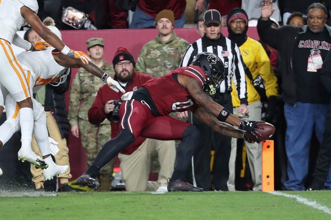 South Carolina tight end Jaheim Bell (0) dives for the end zone to score against Tennessee on Nov. 19 in Columbia, S.C. Bell, a Lake City resident, has entered the transfer portal and will not play in the TaxSlayer Gator Bowl.