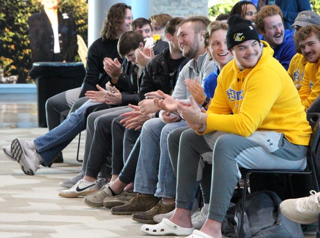 South Dakota State players react to being selected as the No. 1 seed in the FCS playoffs on Sunday in the Club 71 room at Dana J. Dykhouse Stadium.