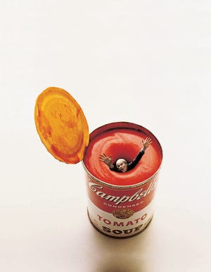George Lois' image of Andy Warhol drowning in a giant can of Campbell's Soup seen in Esquire magazine.