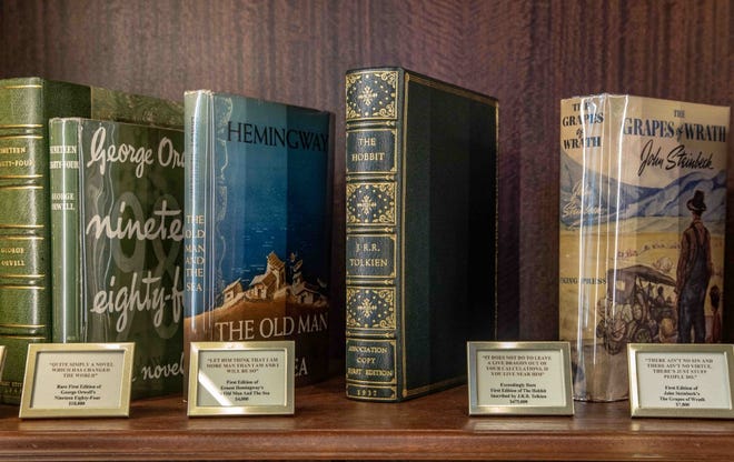An exceedingly rare first edition, first issue presentation copy of J.R.R. Tolkien's "The Hobbit" (center), is for sale at Raptist Rare Books in Palm Beach.