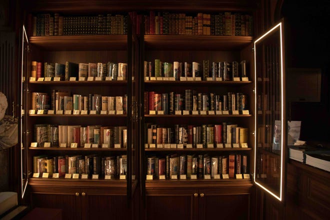 Rare books enclosed in lighted shelves at Raptist Rare Books in its new location, 329 Worth Avenue, November 15, 2022. 