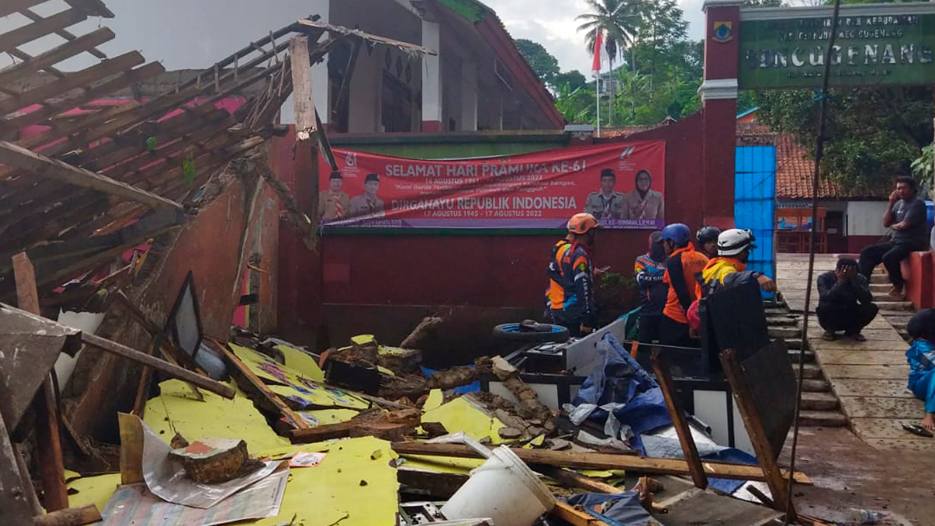 At least 56 dead, hundreds injured after earthquake topples buildings in Indonesia