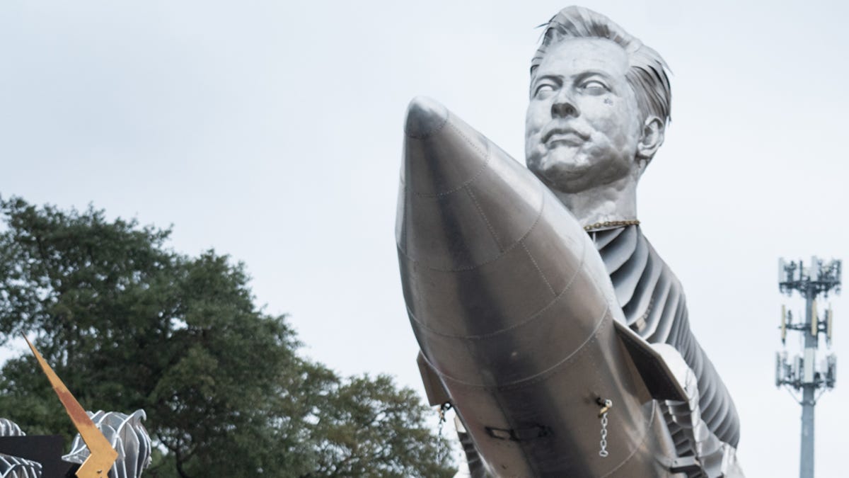 Why is a giant sculpture of Elon Musk on a goat's body being driven around Texas?