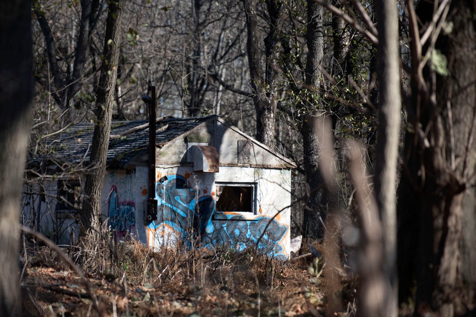 An abandoned radio station stands on Burlington Island on Monday, Nov. 21, 2022. Local not-for-profit Spearhead Project Earth committed to cleaning single use plastics from the 300-acre island located in the Delaware River between Pennsylvania and New Jersey.