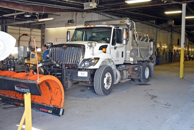 A snow plow apparatus sits at the Grissum Building in November of the Columbia Public Works Department. Columbia Public Works crews are preparing for the next round of winter weather overnight Tuesday.