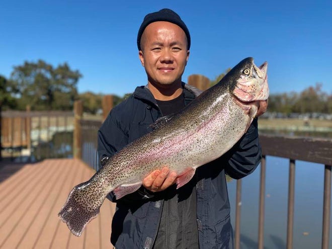 Bee Xiong won place in the adult division of the Trout Bout at Oak Grove Regional Park in Stockton on Nov. 19, 2022, by bagging this 8-pound, 11.6-ounce rainbow trout.