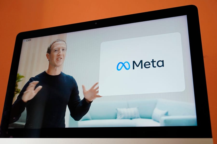 Seen on the screen of a device in Sausalito, Calif., Facebook CEO Mark Zuckerberg announces the company's new name, Meta, during a virtual event on Thursday, Oct. 28, 2021. Zuckerberg promises that the virtual-reality 