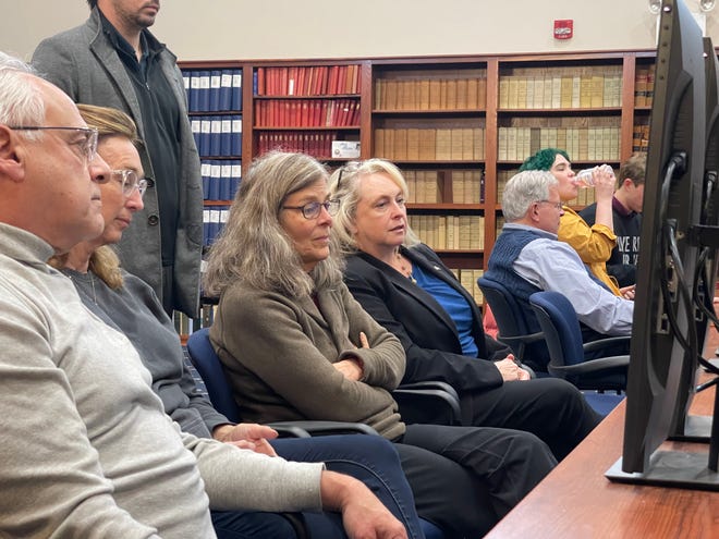 Debra Altschiller, the Democratic nominee who appears to have beaten Republican nominee Lou Gargiulo in the District 24 race for the New Hampshire State Senate, looks on with fellow observers during a recount in the race Tuesday, November 22, 2022.