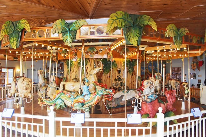 The handmade wooden carousel at LARK Toys