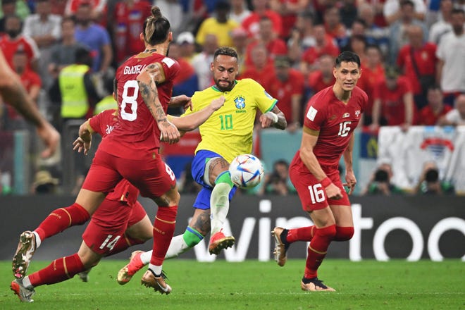 Brazil's Neymar (10) controls the ball against Serbia during their World Cup match on Nov. 24, 2022.