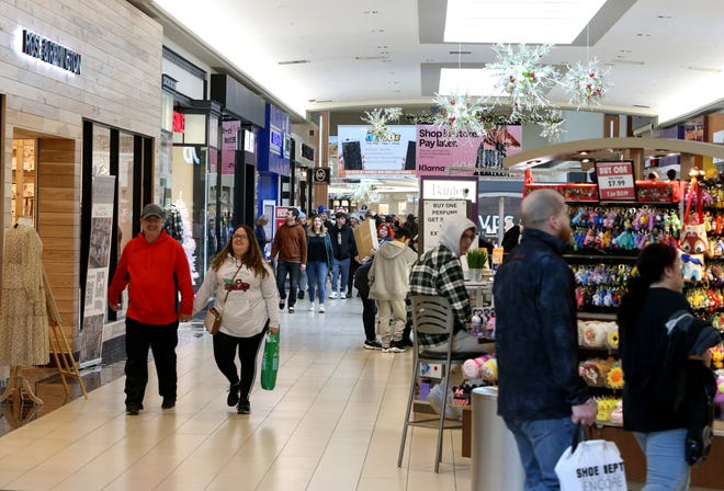 Shoppers look for deals on Black Friday on Nov. 25, 2022, at University Park Mall in Mishawaka.