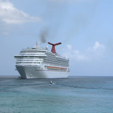 In this June 8, 2010 file photo, two Carnival ship