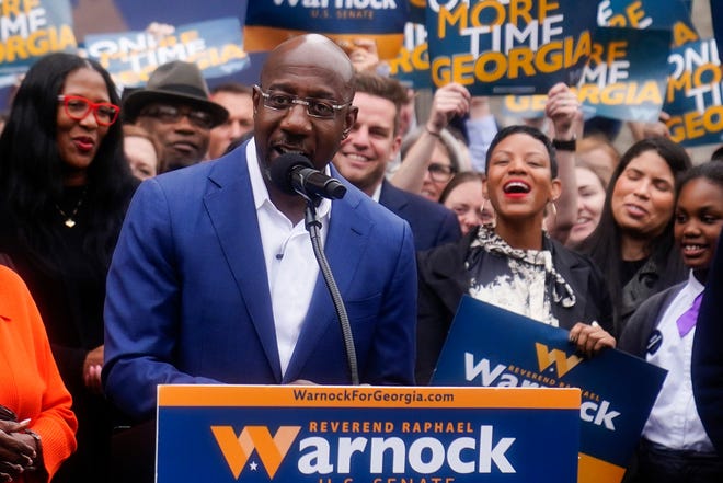 Sen. Raphael Warnock, D-Ga., speaks during a news conference, Nov. 10, 2022, in Atlanta. Warnock is running against Republican Herschel Walker in a runoff election. Democrats have secured their majority in the Senate for the next two years. But holding on to Warnock's seat in Georgia's runoff next month could be crucial to their success.